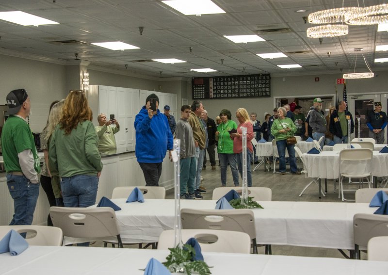 Attendees tour the new facility.